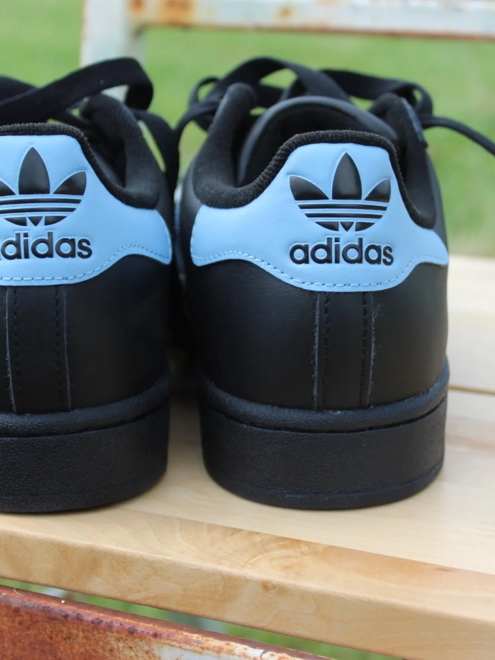 Adidas Superstar Black with Light Blue Stripes